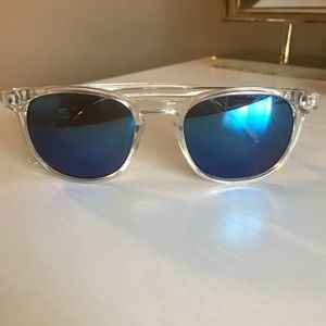 Clear frame , blue mirrored sunglasses